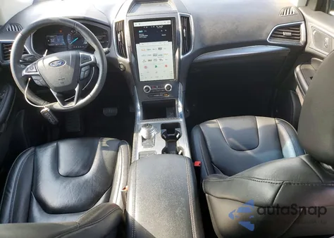 2022 Ford Edge Titanium z USA, uszkodzony, nr VIN 2FMPK4K94NBA29160